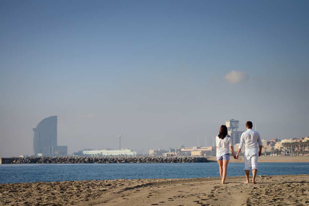 Couple at the beach in Barcelona