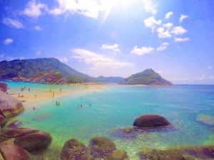 tourists swim at a beach in koh samui thailand