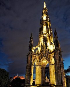 the scott monument lit up at night edinburgh scotland