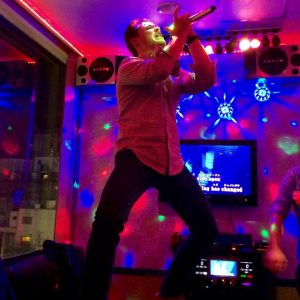 a man sings karaoke in tokyo japan