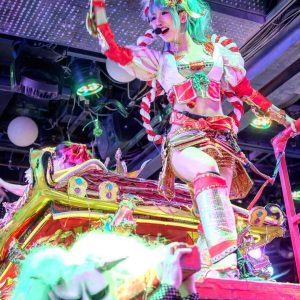 a colourful girl leads the crowd at the robot restaurant tokyo