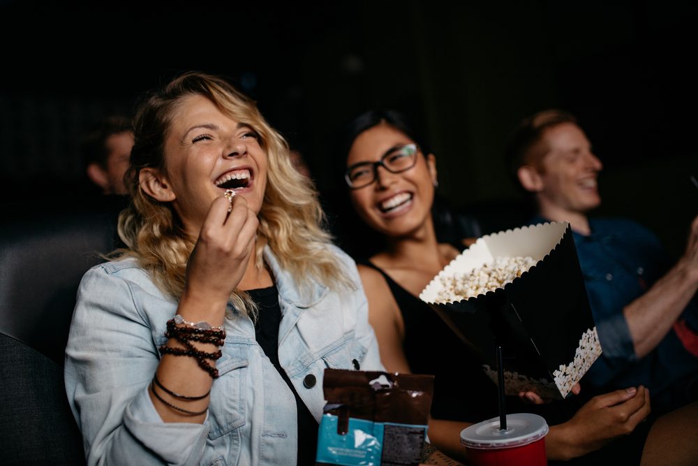 Girls laughing in the theatre